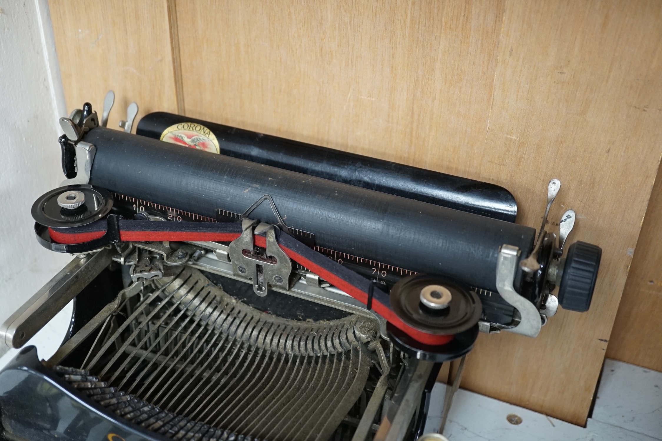 A cased Corona travelling typewriter. Condition - fair